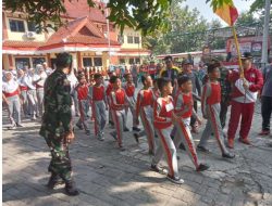 Kecamatan Sukawangi melaksanakan kegiatan lomba gerak jalan Dalam Rangka HUT RI Ke 77 Dan HUT Kabupaten Bekasi Ke 72