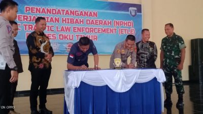 Bupati Enos Bersama Polres OKUT Lakukan Penandatanganan NPHD