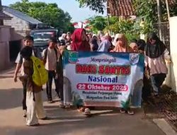 Kades Wandi Ajak Anak-Anak Sekolah Dasar di Desa Jomin Timur Gelar Jalan Santai dalam Rangka Hari Santri 2025